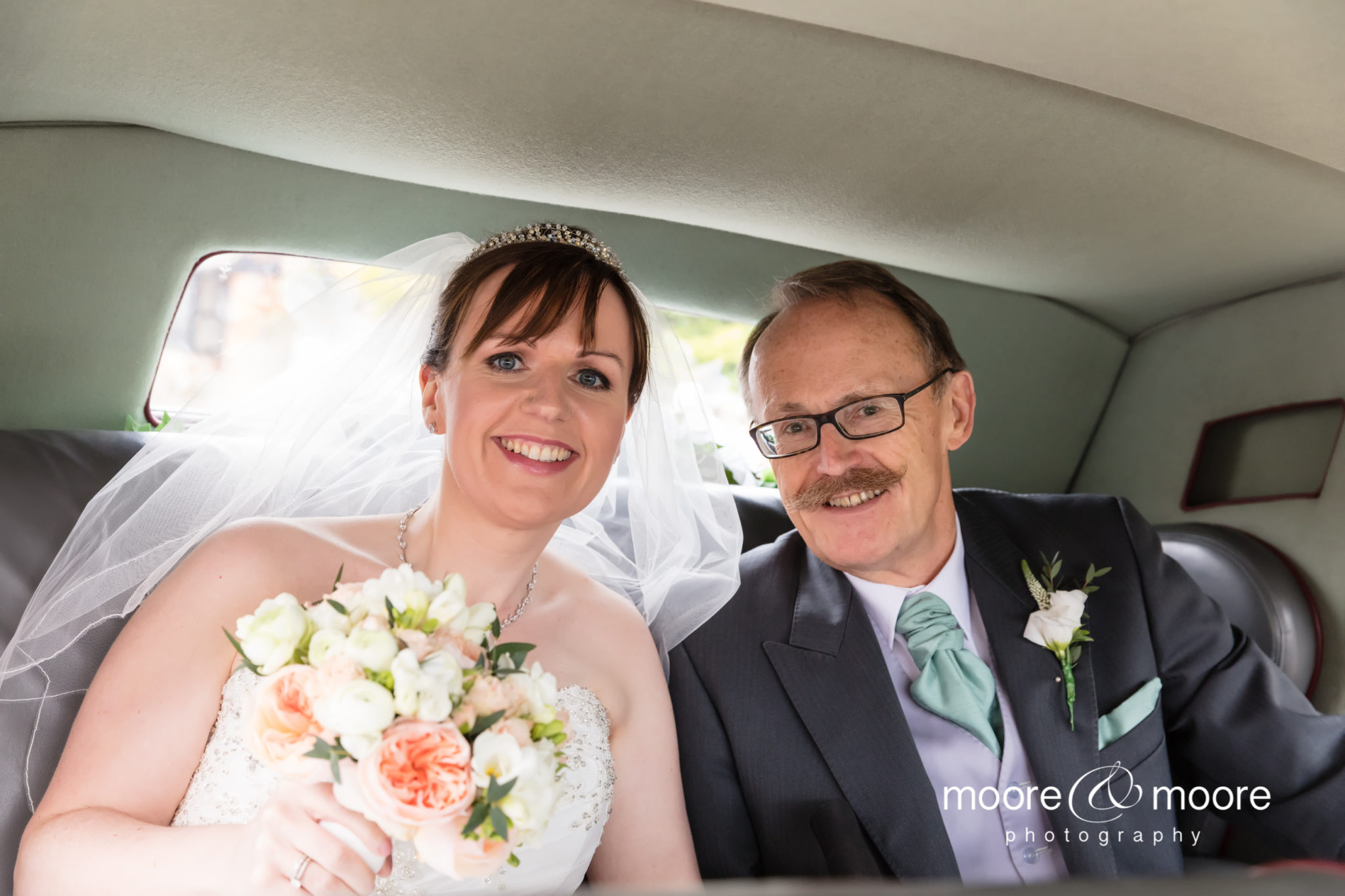 Bride arriving at the church with her father, Kirtlington Park Wedding Photography by Hampshire Photographers, moore&moore photography